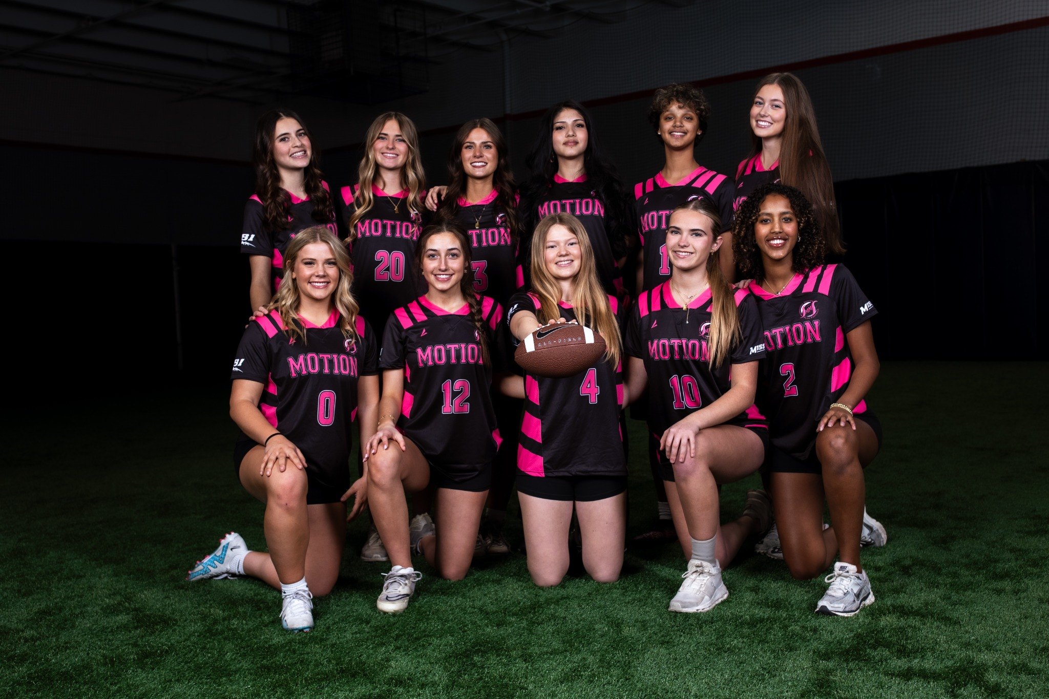 Minnesota Motion team smiling in uniforms